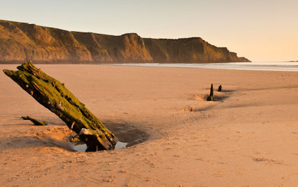 The remains of a ship wreck at Rhossili Bay, Wales 